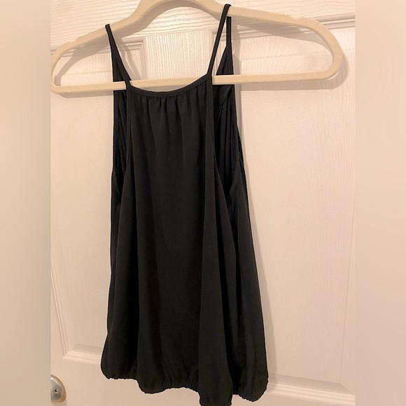 Black, sleeveless spaghetti strap top. Crosses, appears layered in the front. - Picture 3 of 4
